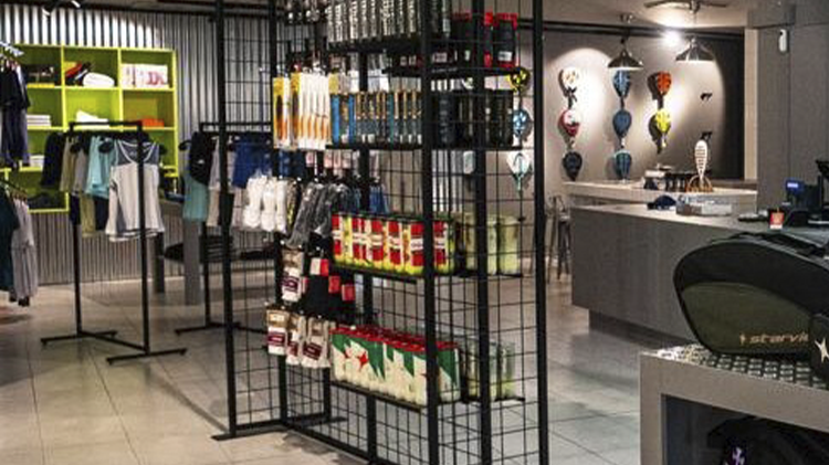 LED focal lighting highlighting products in a padel store